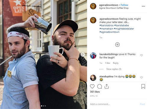 two baristas holding coffee cups next to Instagram comments